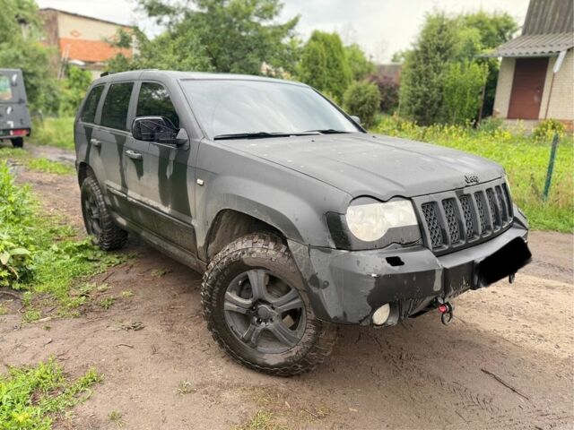 Черный Джип Гранд Чероки, объемом двигателя 3 л и пробегом 400 тыс. км за 7500 $, фото 2 на Automoto.ua