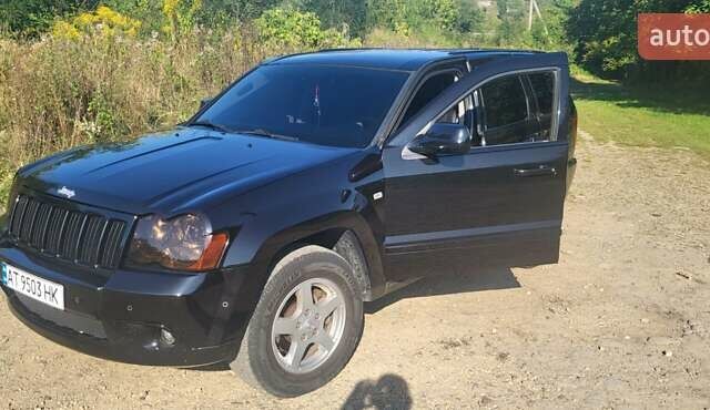 Чорний Джип Grand Cherokee, об'ємом двигуна 5.7 л та пробігом 300 тис. км за 13700 $, фото 2 на Automoto.ua