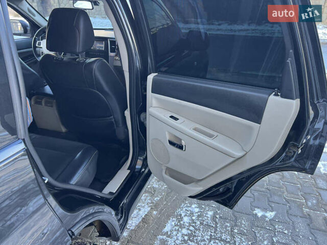 Черный Джип Гранд Чероки, объемом двигателя 5.7 л и пробегом 300 тыс. км за 11700 $, фото 8 на Automoto.ua