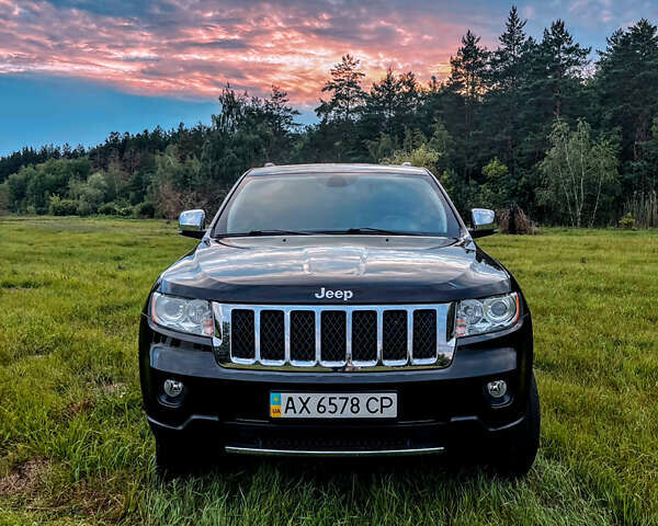 Черный Джип Гранд Чероки, объемом двигателя 3.6 л и пробегом 140 тыс. км за 21000 $, фото 1 на Automoto.ua