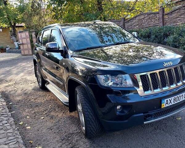 Черный Джип Гранд Чероки, объемом двигателя 2.99 л и пробегом 92 тыс. км за 20000 $, фото 1 на Automoto.ua