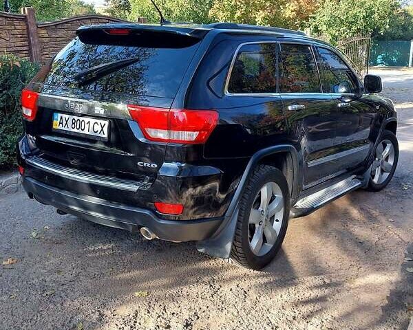 Черный Джип Гранд Чероки, объемом двигателя 2.99 л и пробегом 92 тыс. км за 20000 $, фото 6 на Automoto.ua