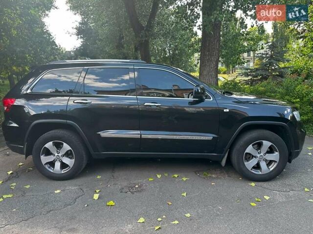 Чорний Джип Grand Cherokee, об'ємом двигуна 3 л та пробігом 260 тис. км за 19440 $, фото 2 на Automoto.ua