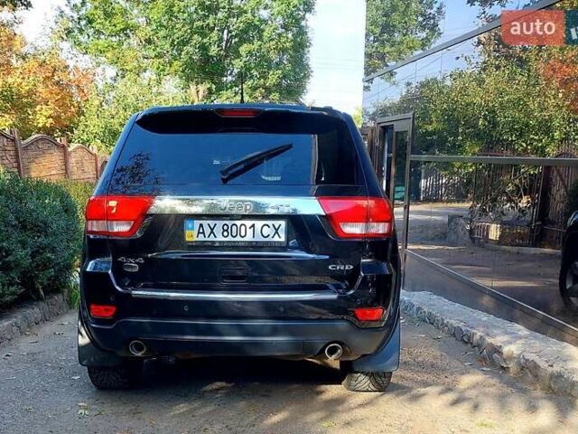 Черный Джип Гранд Чероки, объемом двигателя 2.99 л и пробегом 92 тыс. км за 20000 $, фото 2 на Automoto.ua