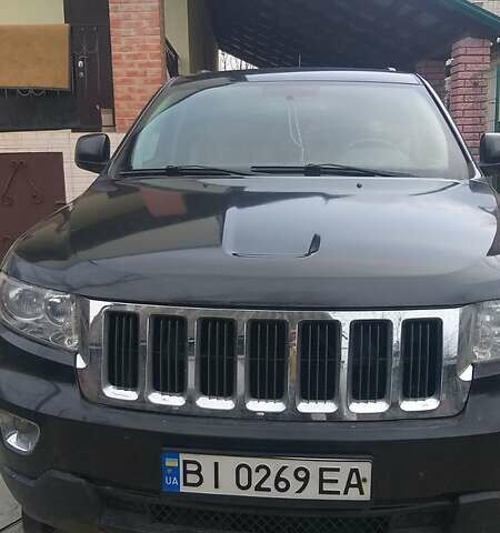 Чорний Джип Grand Cherokee, об'ємом двигуна 3.6 л та пробігом 75 тис. км за 13000 $, фото 2 на Automoto.ua