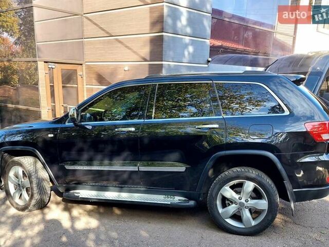 Черный Джип Гранд Чероки, объемом двигателя 2.99 л и пробегом 92 тыс. км за 20000 $, фото 4 на Automoto.ua