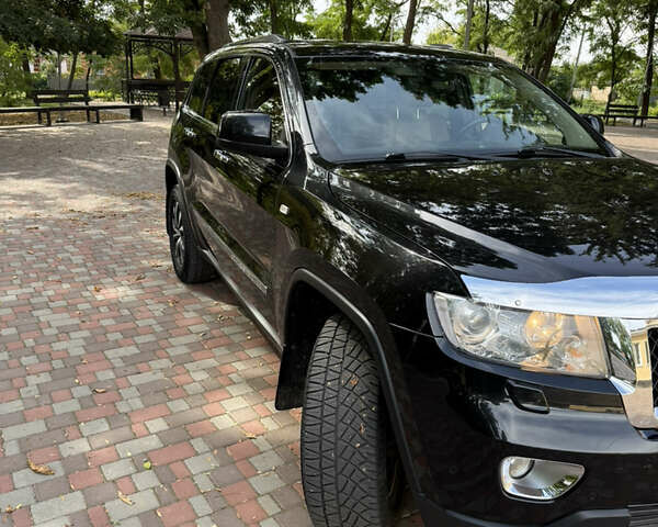 Чорний Джип Grand Cherokee, об'ємом двигуна 2.99 л та пробігом 165 тис. км за 18000 $, фото 2 на Automoto.ua