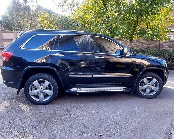 Черный Джип Гранд Чероки, объемом двигателя 2.99 л и пробегом 92 тыс. км за 20000 $, фото 7 на Automoto.ua