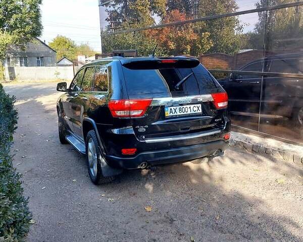 Черный Джип Гранд Чероки, объемом двигателя 2.99 л и пробегом 92 тыс. км за 20000 $, фото 3 на Automoto.ua