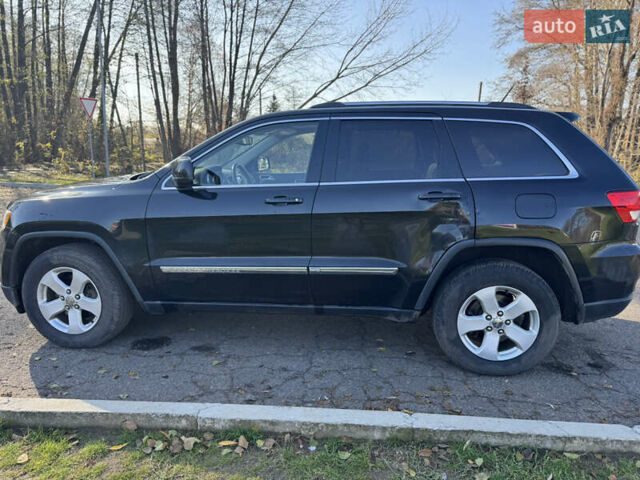 Чорний Джип Grand Cherokee, об'ємом двигуна 3.6 л та пробігом 245 тис. км за 8000 $, фото 1 на Automoto.ua