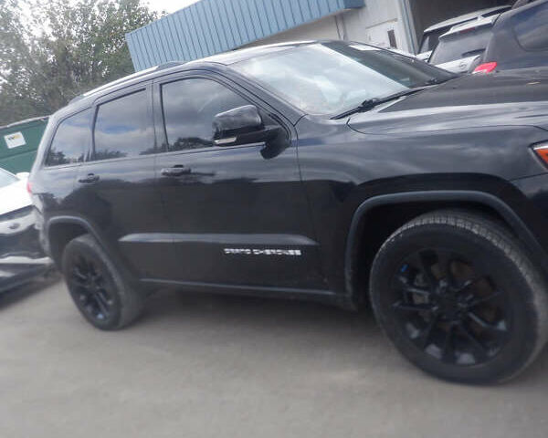 Чорний Джип Grand Cherokee, об'ємом двигуна 3 л та пробігом 230 тис. км за 19200 $, фото 1 на Automoto.ua