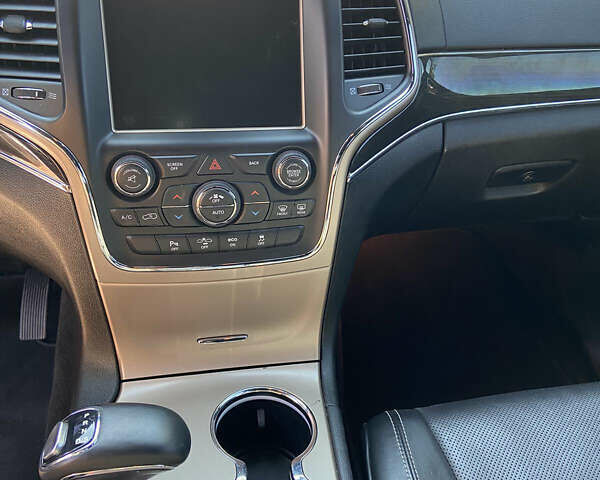 Чорний Джип Grand Cherokee, об'ємом двигуна 3 л та пробігом 141 тис. км за 24000 $, фото 4 на Automoto.ua