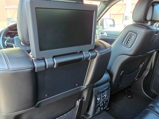 Черный Джип Гранд Чероки, объемом двигателя 5.7 л и пробегом 180 тыс. км за 22500 $, фото 10 на Automoto.ua