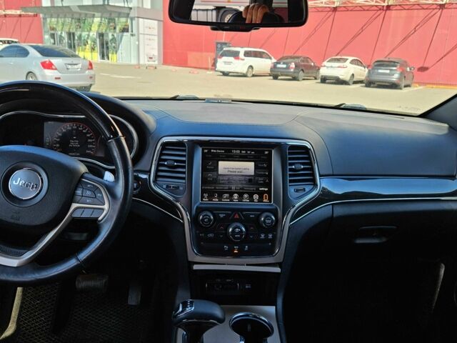 Черный Джип Гранд Чероки, объемом двигателя 5.7 л и пробегом 180 тыс. км за 22500 $, фото 13 на Automoto.ua