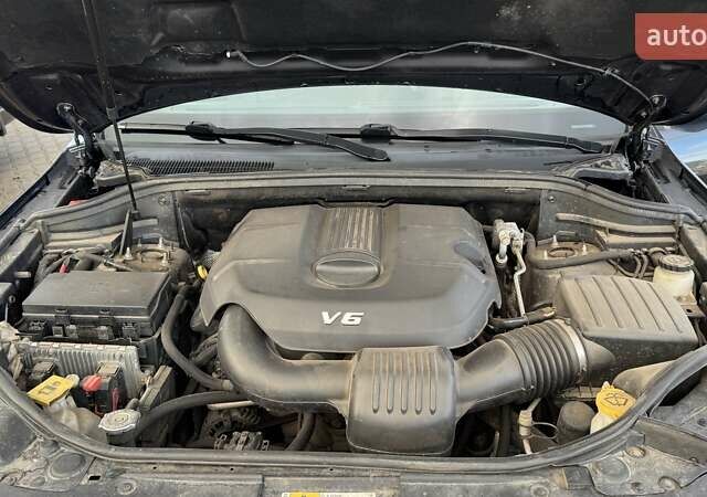 Черный Джип Гранд Чероки, объемом двигателя 3.6 л и пробегом 165 тыс. км за 19000 $, фото 13 на Automoto.ua