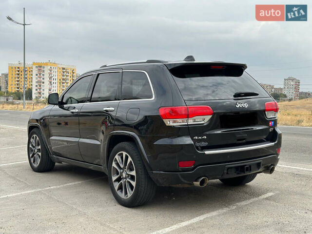 Чорний Джип Grand Cherokee, об'ємом двигуна 5.65 л та пробігом 250 тис. км за 19000 $, фото 3 на Automoto.ua