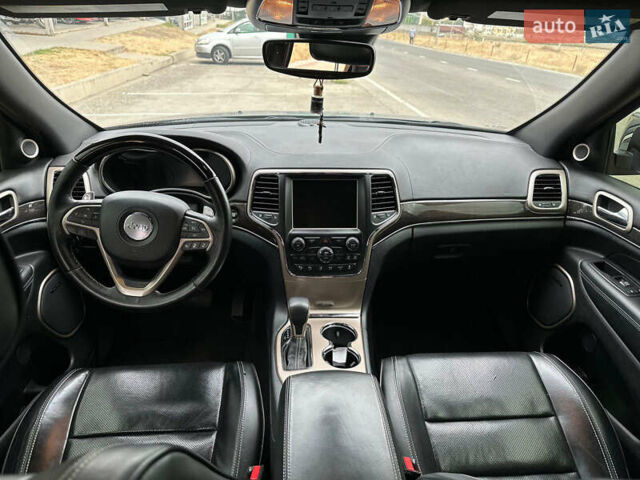 Чорний Джип Grand Cherokee, об'ємом двигуна 5.65 л та пробігом 250 тис. км за 19000 $, фото 9 на Automoto.ua