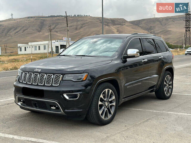 Чорний Джип Grand Cherokee, об'ємом двигуна 5.65 л та пробігом 250 тис. км за 19000 $, фото 4 на Automoto.ua