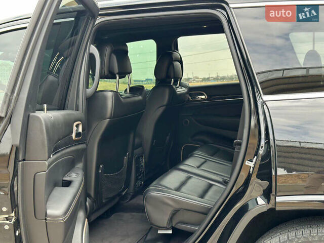 Чорний Джип Grand Cherokee, об'ємом двигуна 5.65 л та пробігом 250 тис. км за 19000 $, фото 10 на Automoto.ua