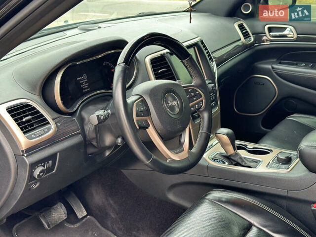 Чорний Джип Grand Cherokee, об'ємом двигуна 5.65 л та пробігом 250 тис. км за 19000 $, фото 5 на Automoto.ua