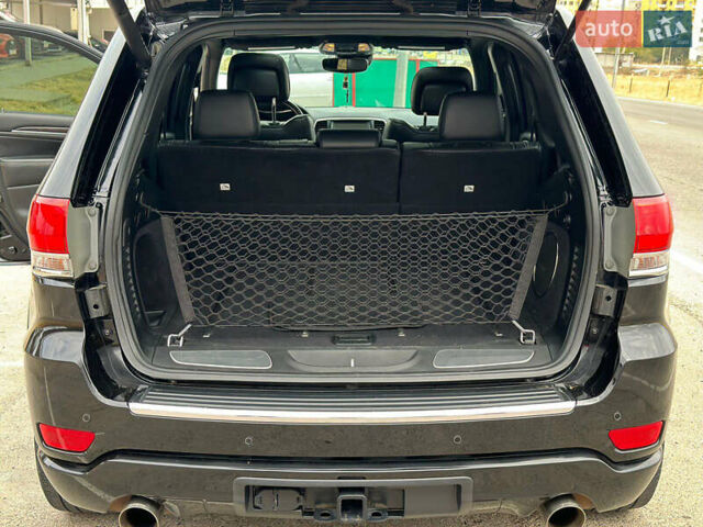 Чорний Джип Grand Cherokee, об'ємом двигуна 5.65 л та пробігом 250 тис. км за 19000 $, фото 11 на Automoto.ua