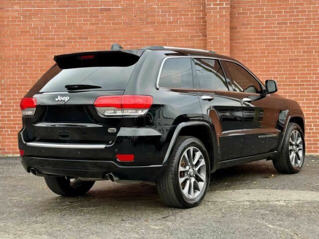 Чорний Джип Grand Cherokee, об'ємом двигуна 3.6 л та пробігом 67 тис. км за 13500 $, фото 6 на Automoto.ua