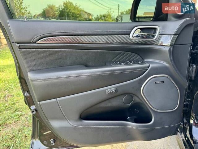 Чорний Джип Grand Cherokee, об'ємом двигуна 6.4 л та пробігом 131 тис. км за 34999 $, фото 24 на Automoto.ua
