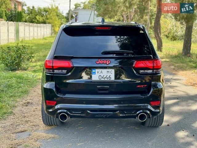 Чорний Джип Grand Cherokee, об'ємом двигуна 6.42 л та пробігом 120 тис. км за 35500 $, фото 5 на Automoto.ua