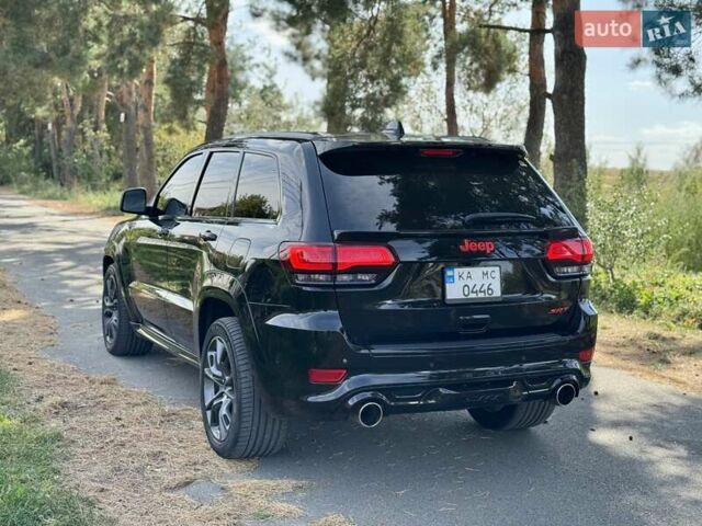 Чорний Джип Grand Cherokee, об'ємом двигуна 6.42 л та пробігом 120 тис. км за 35500 $, фото 4 на Automoto.ua