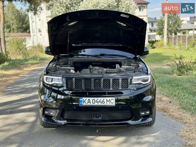 Чорний Джип Grand Cherokee, об'ємом двигуна 6.42 л та пробігом 120 тис. км за 35500 $, фото 9 на Automoto.ua