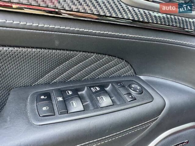Чорний Джип Grand Cherokee, об'ємом двигуна 6.42 л та пробігом 120 тис. км за 35500 $, фото 27 на Automoto.ua