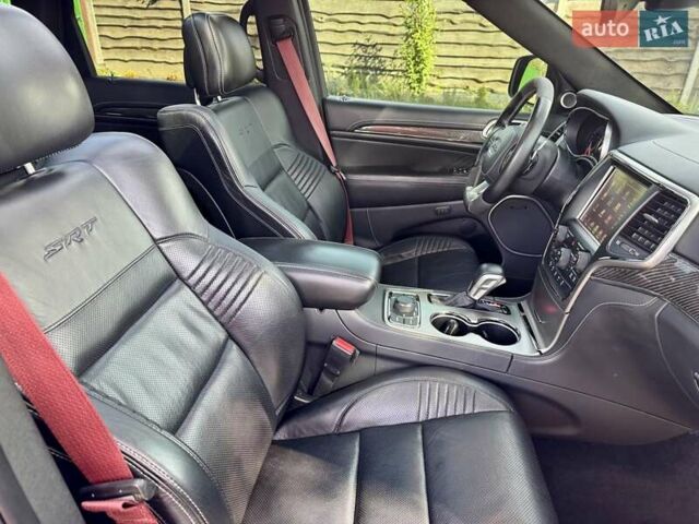 Чорний Джип Grand Cherokee, об'ємом двигуна 6.42 л та пробігом 120 тис. км за 35500 $, фото 50 на Automoto.ua