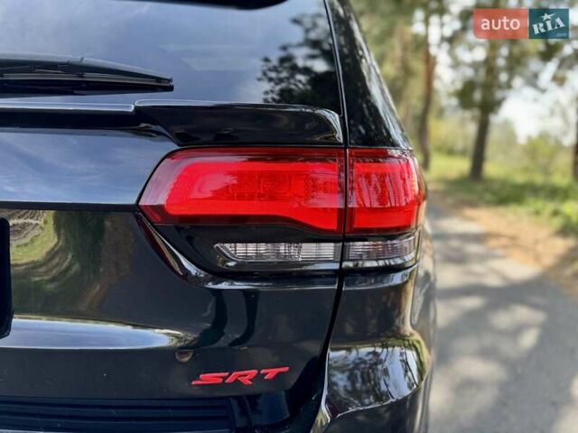 Чорний Джип Grand Cherokee, об'ємом двигуна 6.42 л та пробігом 120 тис. км за 35500 $, фото 16 на Automoto.ua