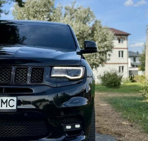 Чорний Джип Grand Cherokee, об'ємом двигуна 6.4 л та пробігом 131 тис. км за 34999 $, фото 13 на Automoto.ua