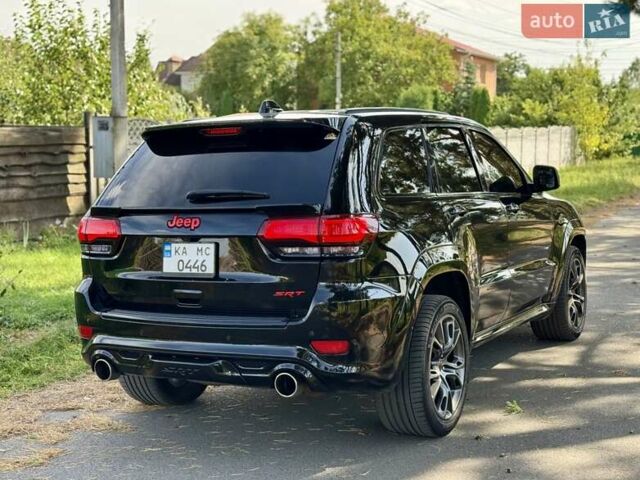 Чорний Джип Grand Cherokee, об'ємом двигуна 6.42 л та пробігом 120 тис. км за 35500 $, фото 6 на Automoto.ua