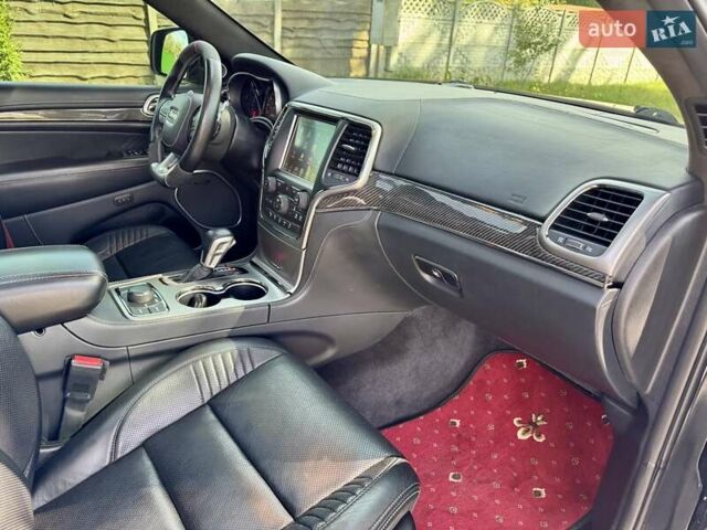 Чорний Джип Grand Cherokee, об'ємом двигуна 6.4 л та пробігом 131 тис. км за 34999 $, фото 46 на Automoto.ua