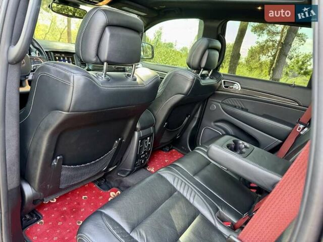 Чорний Джип Grand Cherokee, об'ємом двигуна 6.4 л та пробігом 131 тис. км за 34999 $, фото 50 на Automoto.ua
