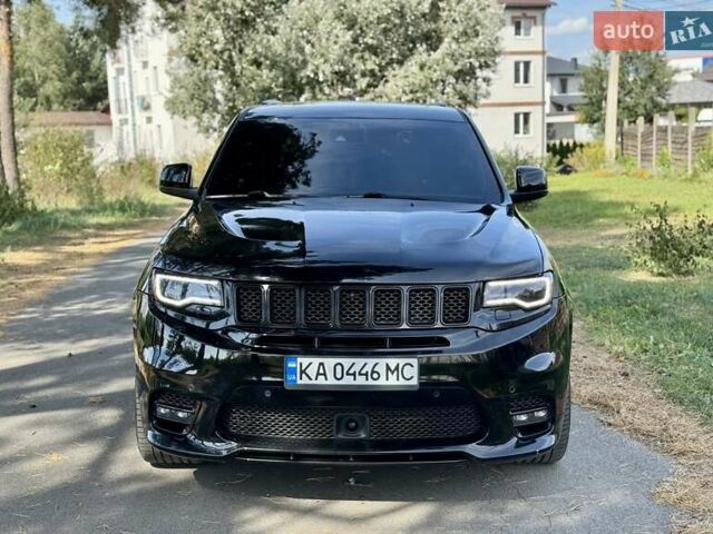 Чорний Джип Grand Cherokee, об'ємом двигуна 6.42 л та пробігом 120 тис. км за 35500 $, фото 1 на Automoto.ua