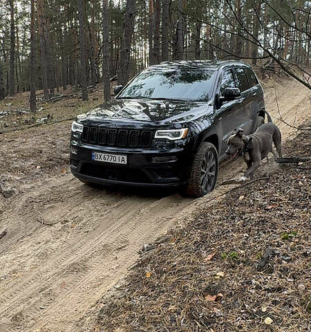 Черный Джип Гранд Чероки, объемом двигателя 5.65 л и пробегом 86 тыс. км за 35000 $, фото 1 на Automoto.ua