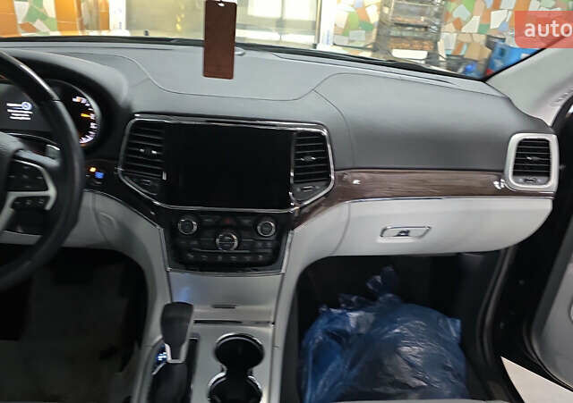 Черный Джип Гранд Чероки, объемом двигателя 5.65 л и пробегом 86 тыс. км за 35000 $, фото 27 на Automoto.ua