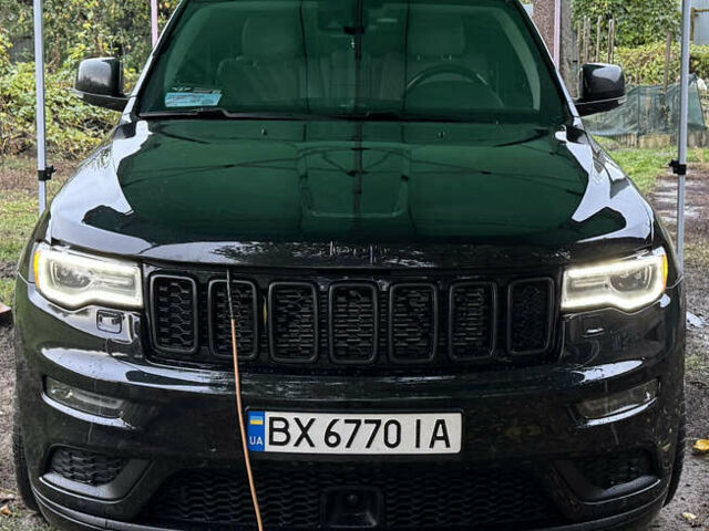 Черный Джип Гранд Чероки, объемом двигателя 5.65 л и пробегом 86 тыс. км за 35000 $, фото 6 на Automoto.ua