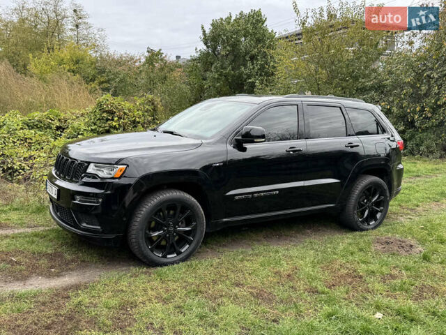 Черный Джип Гранд Чероки, объемом двигателя 5.65 л и пробегом 86 тыс. км за 35000 $, фото 12 на Automoto.ua