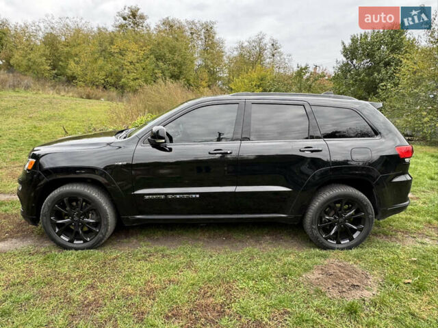Черный Джип Гранд Чероки, объемом двигателя 5.65 л и пробегом 86 тыс. км за 35000 $, фото 9 на Automoto.ua