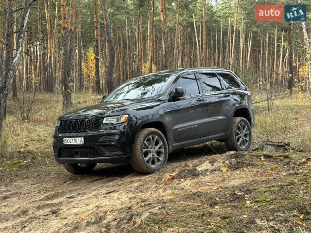 Черный Джип Гранд Чероки, объемом двигателя 5.65 л и пробегом 86 тыс. км за 35000 $, фото 3 на Automoto.ua