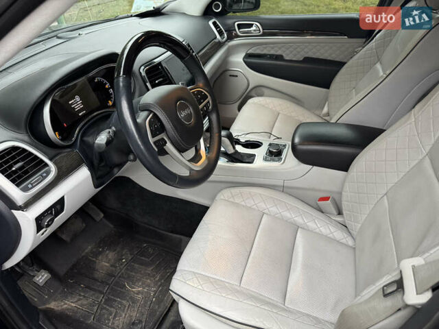 Черный Джип Гранд Чероки, объемом двигателя 5.65 л и пробегом 86 тыс. км за 35000 $, фото 22 на Automoto.ua