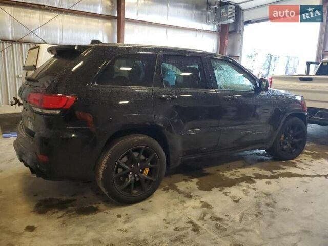 Черный Джип Гранд Чероки, объемом двигателя 6.2 л и пробегом 131 тыс. км за 4300 $, фото 2 на Automoto.ua