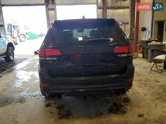Черный Джип Гранд Чероки, объемом двигателя 6.2 л и пробегом 131 тыс. км за 4300 $, фото 5 на Automoto.ua