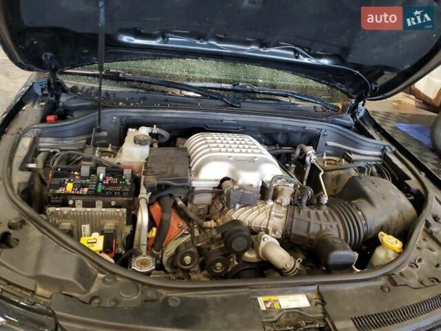 Черный Джип Гранд Чероки, объемом двигателя 6.2 л и пробегом 131 тыс. км за 4300 $, фото 10 на Automoto.ua