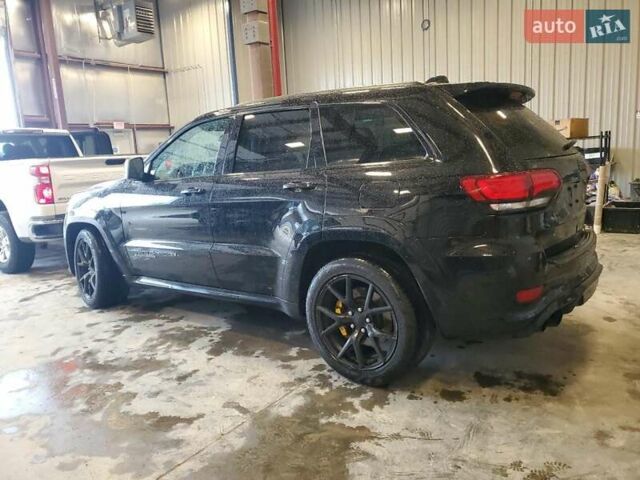 Черный Джип Гранд Чероки, объемом двигателя 6.2 л и пробегом 131 тыс. км за 4300 $, фото 1 на Automoto.ua