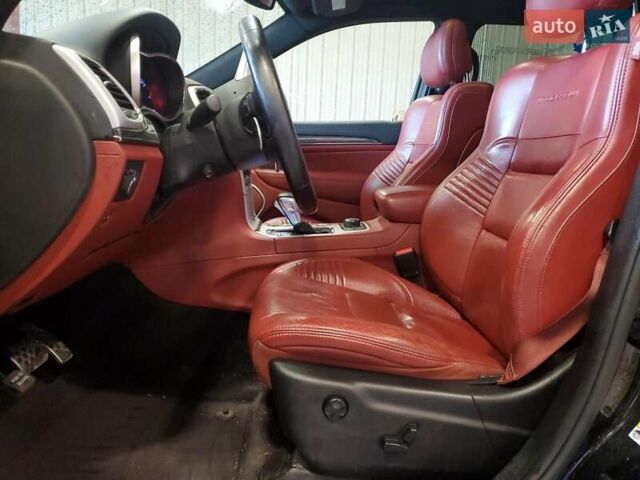 Черный Джип Гранд Чероки, объемом двигателя 6.2 л и пробегом 131 тыс. км за 4300 $, фото 6 на Automoto.ua